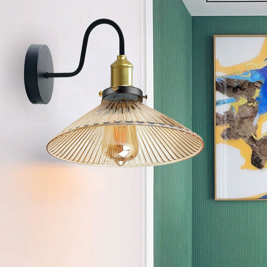 ribbed glass wall light near the window site with bulb