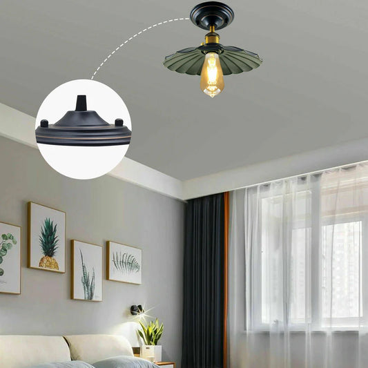 Black single-outlet metal ceiling rose light base installed on a grey ceiling with a green vintage pendant light.
