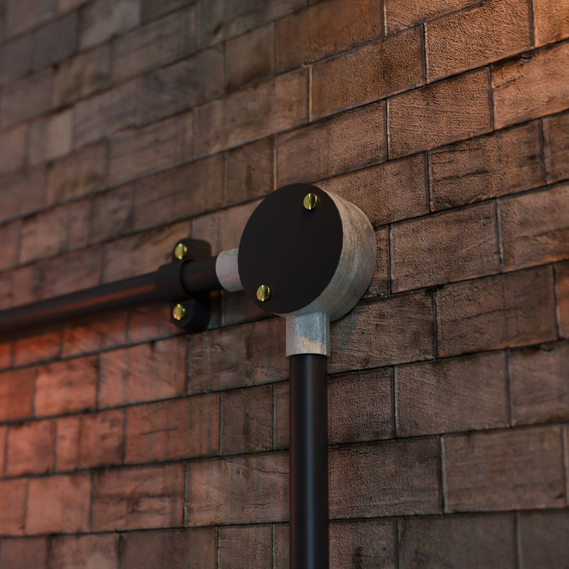 Galvanized Steel 20mm Terminal Outlet Box with multiple entry points.