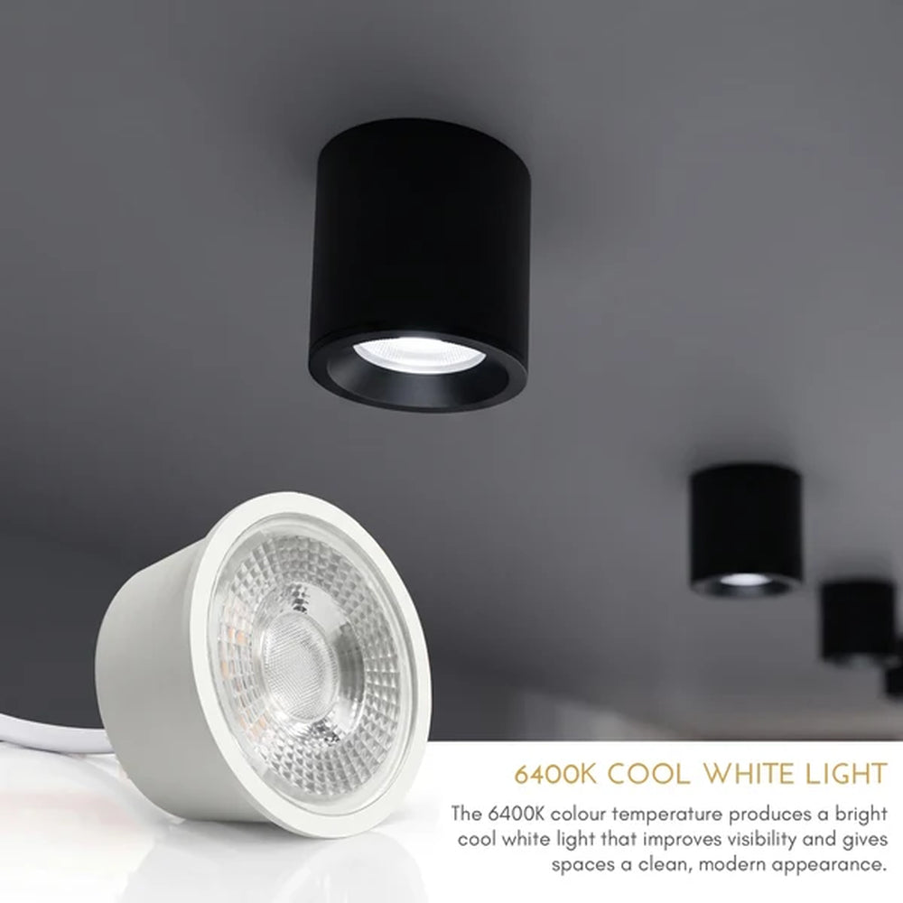 7W LED module in front of black surface spotlights on a ceiling