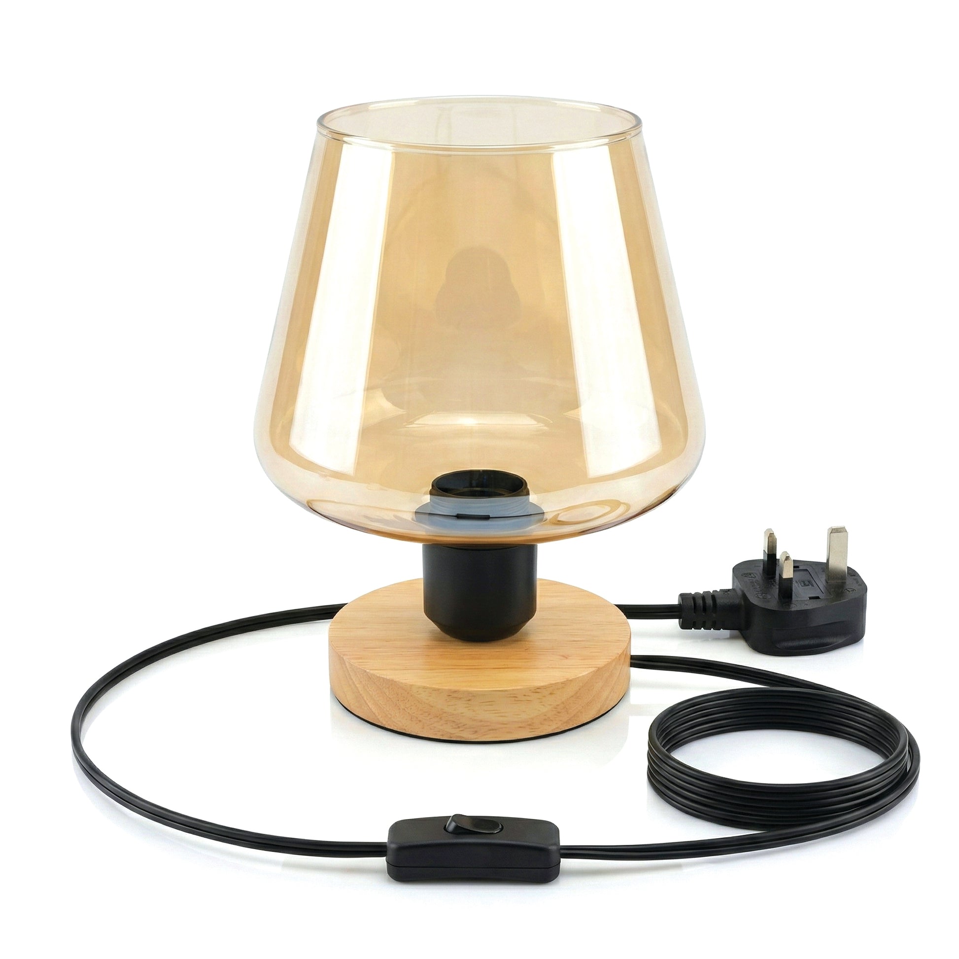 Table lamp with wooden base and glass shade on a white background