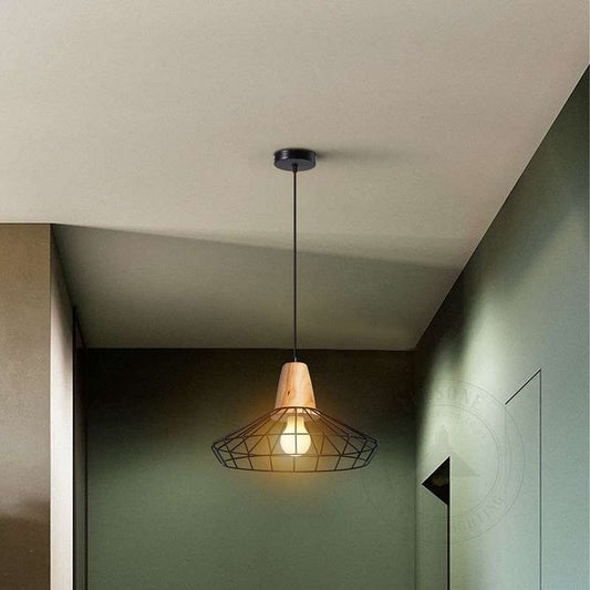Modern black cage pendant light hanging in a stylish kitchen interior