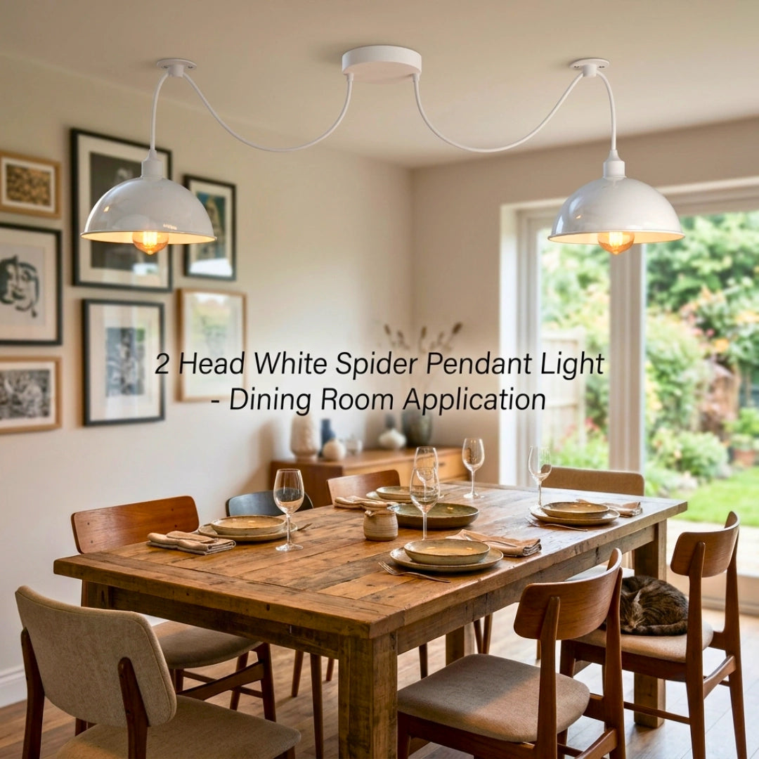 Dining room with 2-head white spider pendant lights, table set for dinner.