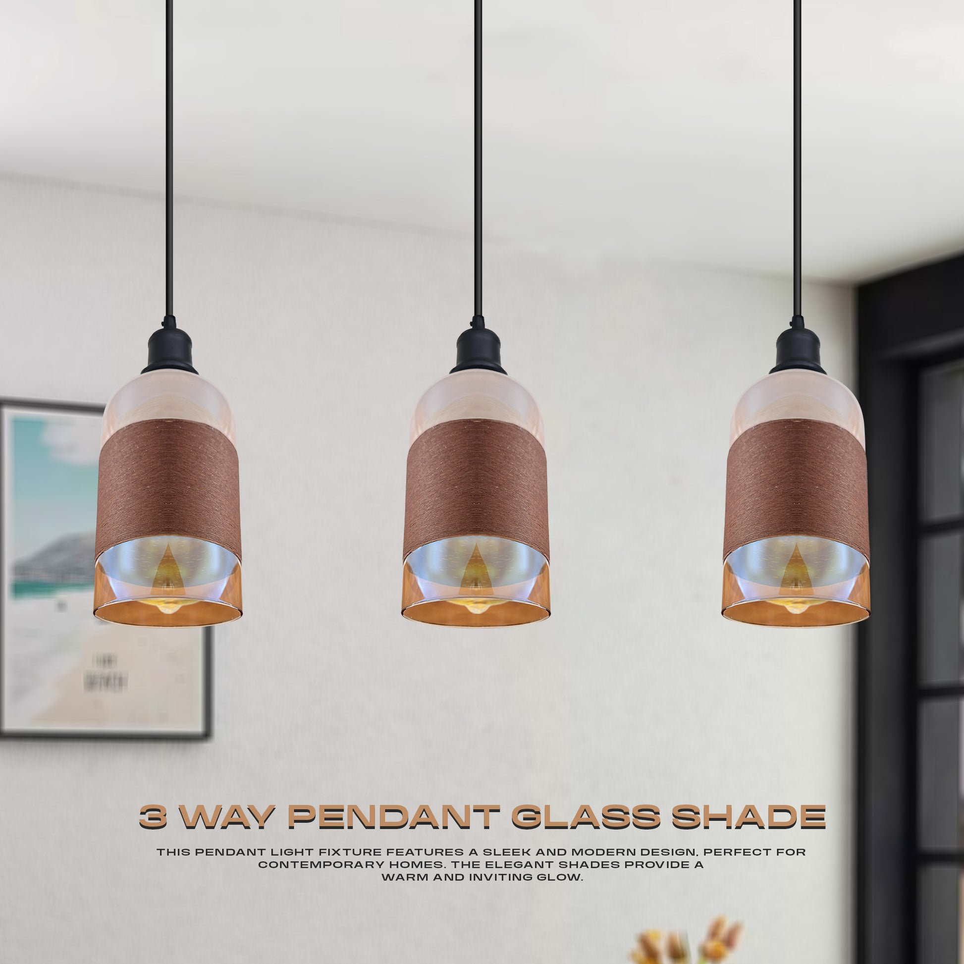 Three pendant lights with glass shades hanging in a room.