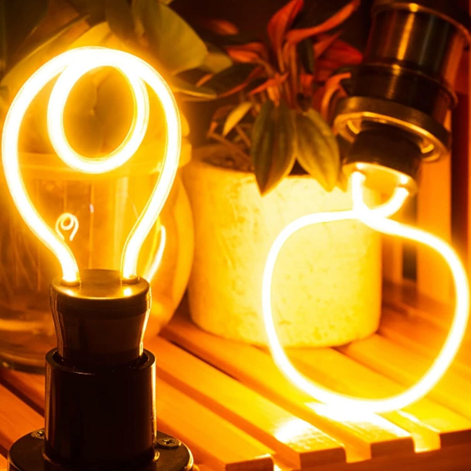 Decorative vintage LED bulb with a glowing shaped filament vintage neon bulb LED filament light E27 screw bulb decorative night light vintage sign light 4W filament bulb style bulb