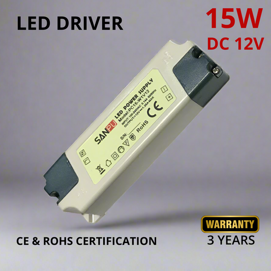 A beige LED driver transformer with 'DC 12V 15W' printed on it, indicating the output voltage and power.