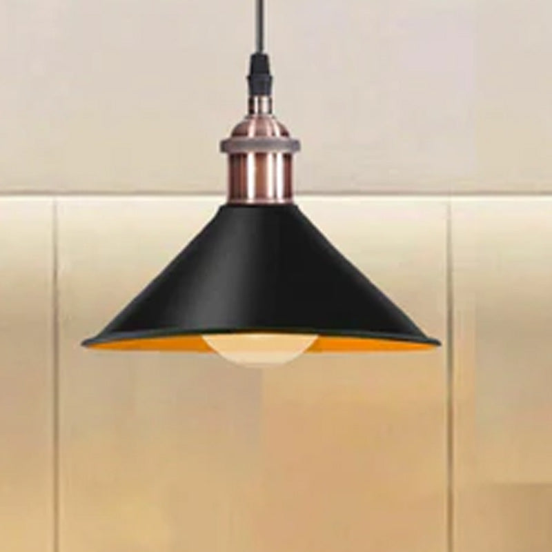 A black metal pendant ceiling light with a copper holder