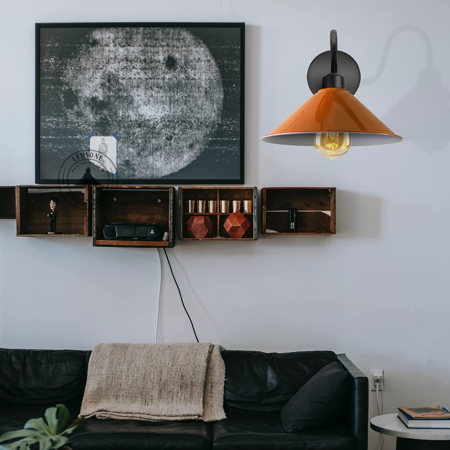 Industrial orange wall light featuring a black swan neck arm