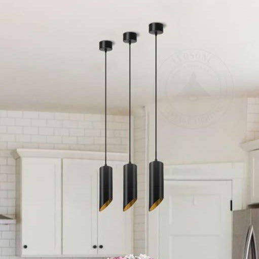 Hanging light fixture over deals kitchen table