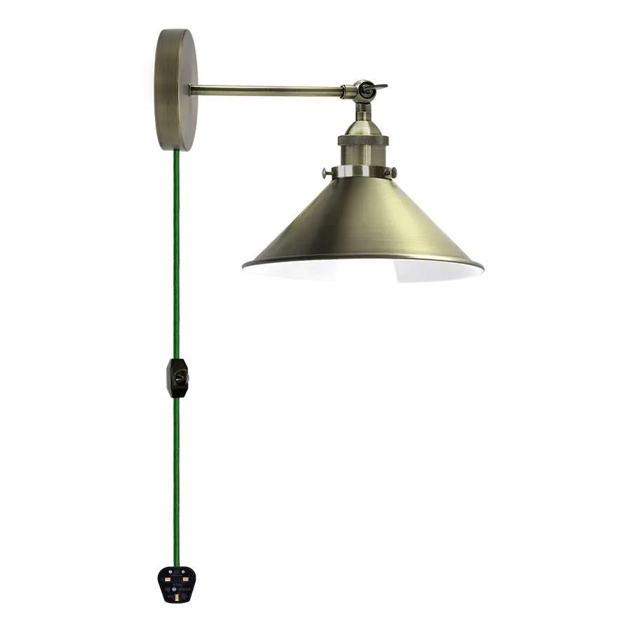Green brass plug in wall light without bulb