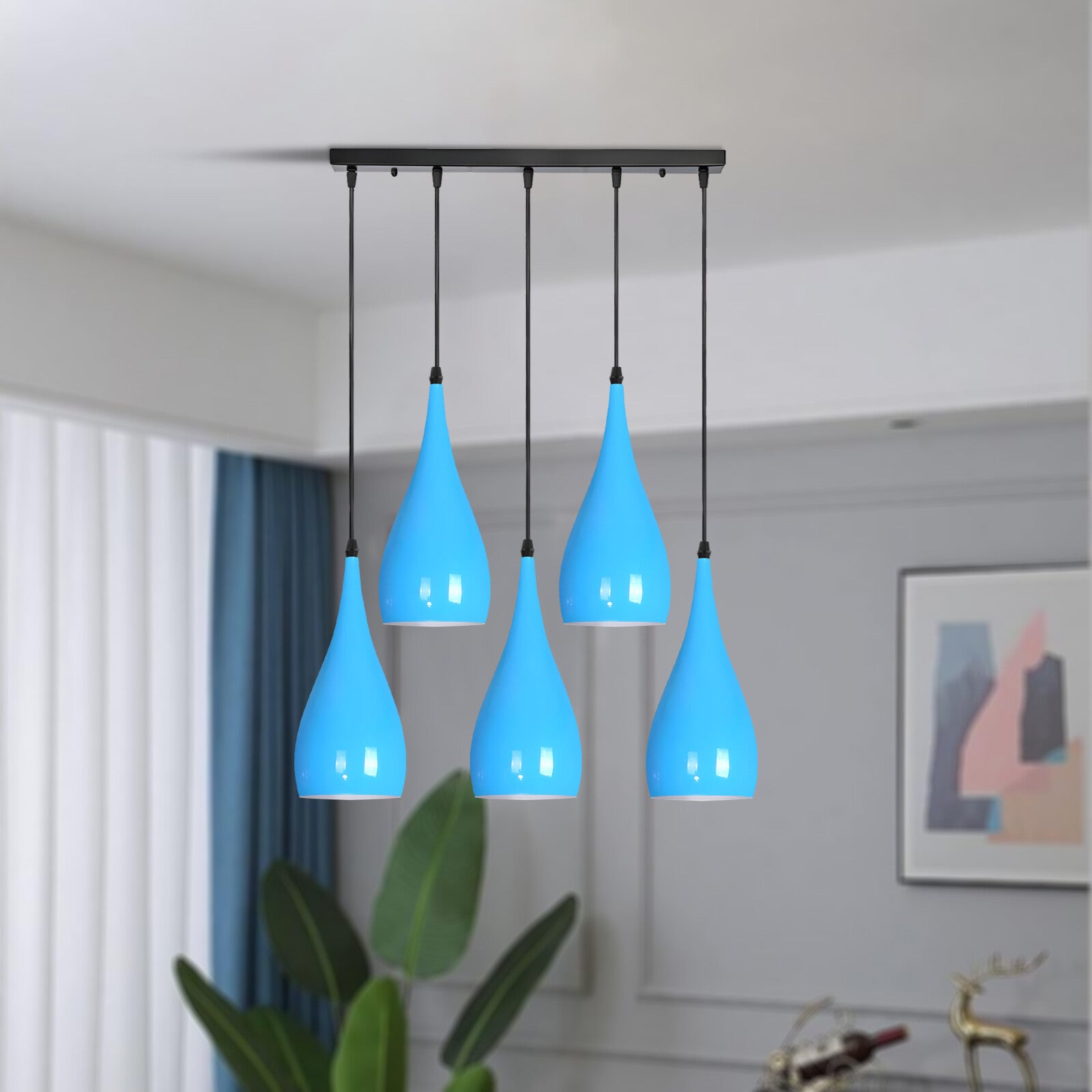 Modern pendant light for stairwell with long cable drop