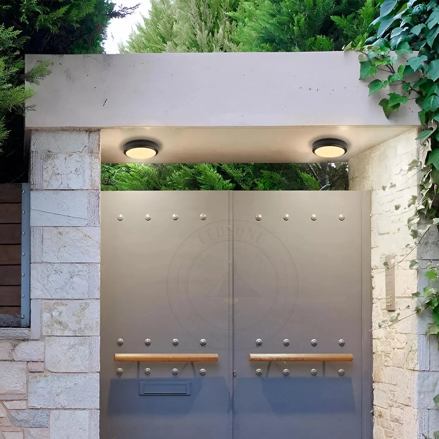 LED round bulkhead ceiling lights mounted on outdoor entrance gate canopy, providing bright and secure lighting – available at Ledsone.