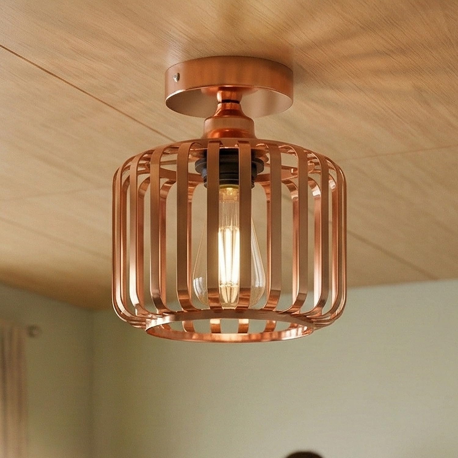 A clean, well-lit shot of the rose gold cage fixture on a pure white background to highlight the metallic finish