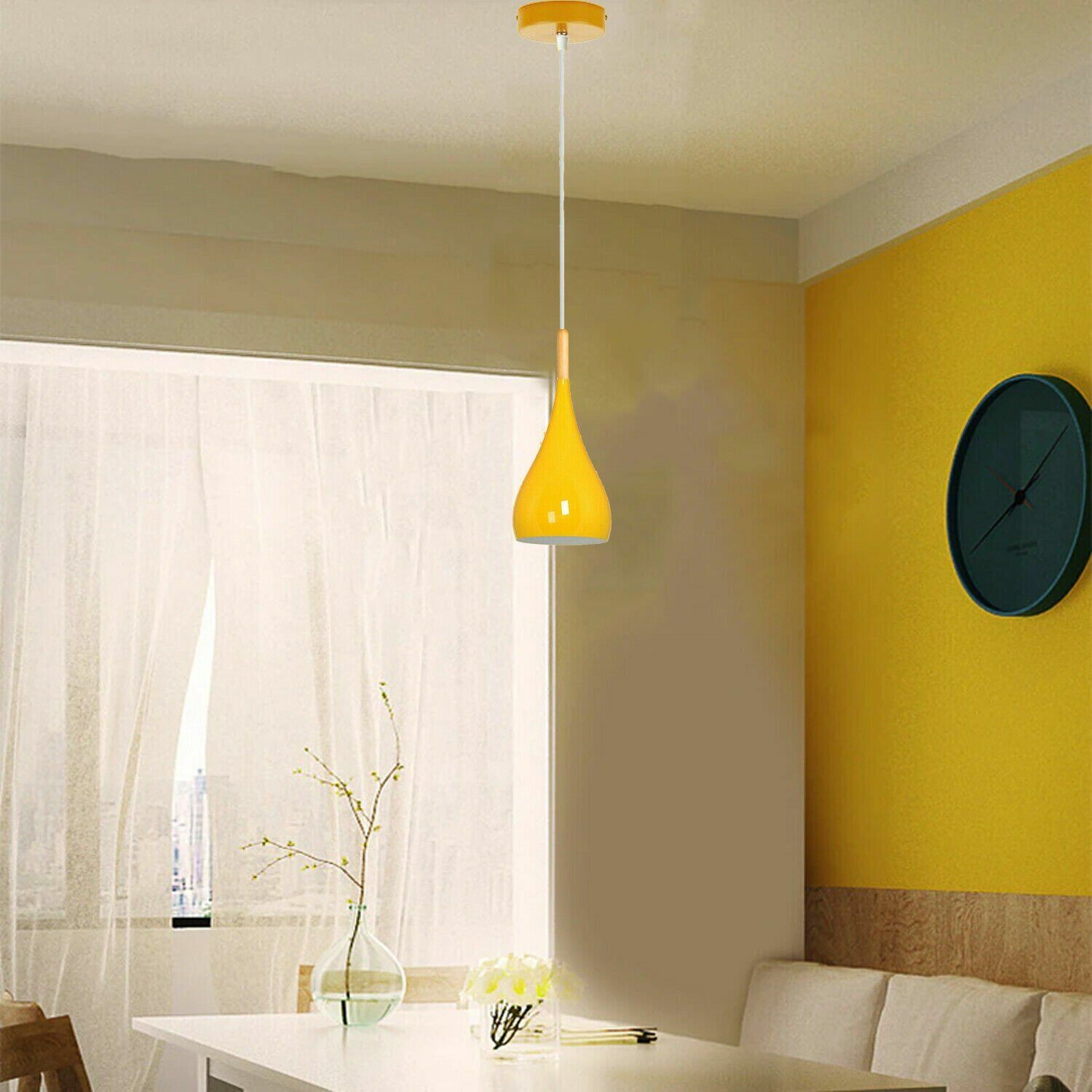 yellow ceiling pendant light over Dining table