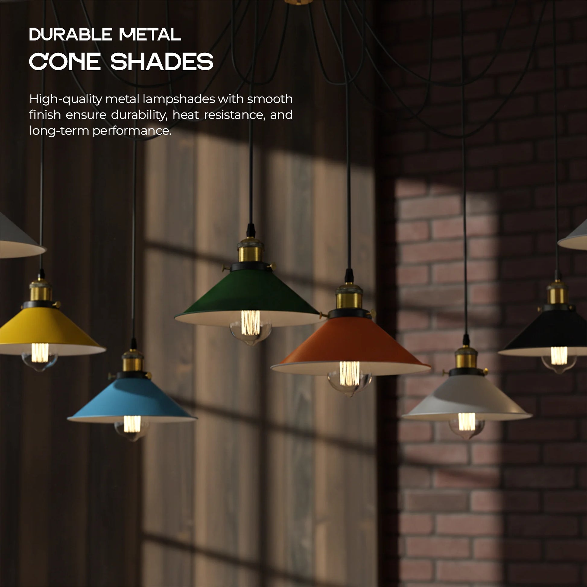 Colorful pendant lights with metal cone shades against a brick wall.