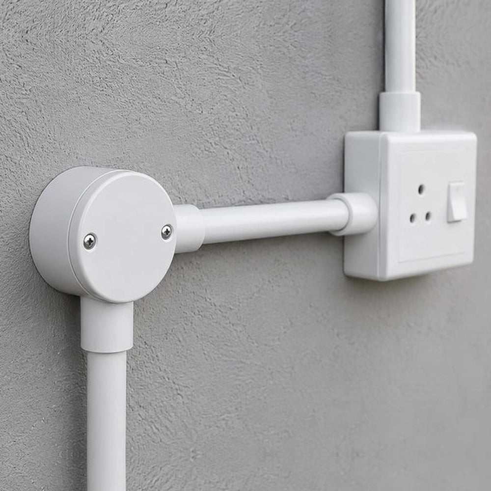 angle junction box and conduit run next to a wall socket
