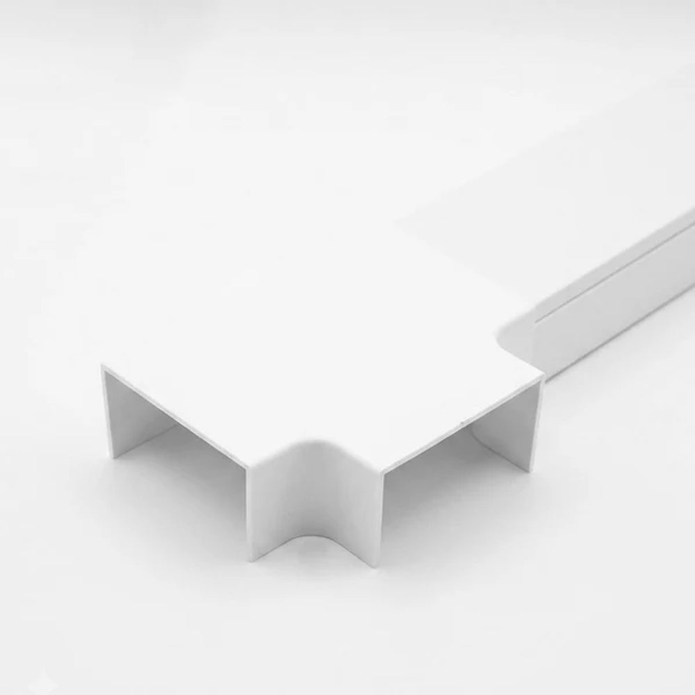 close up of a white trunking T-junction piece