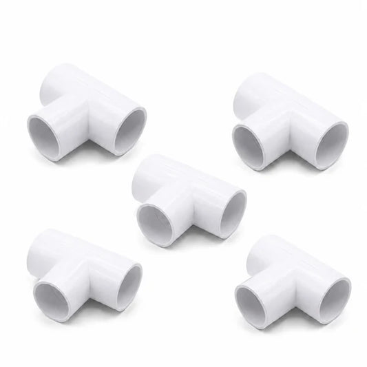 five white PVC conduit T-pieces