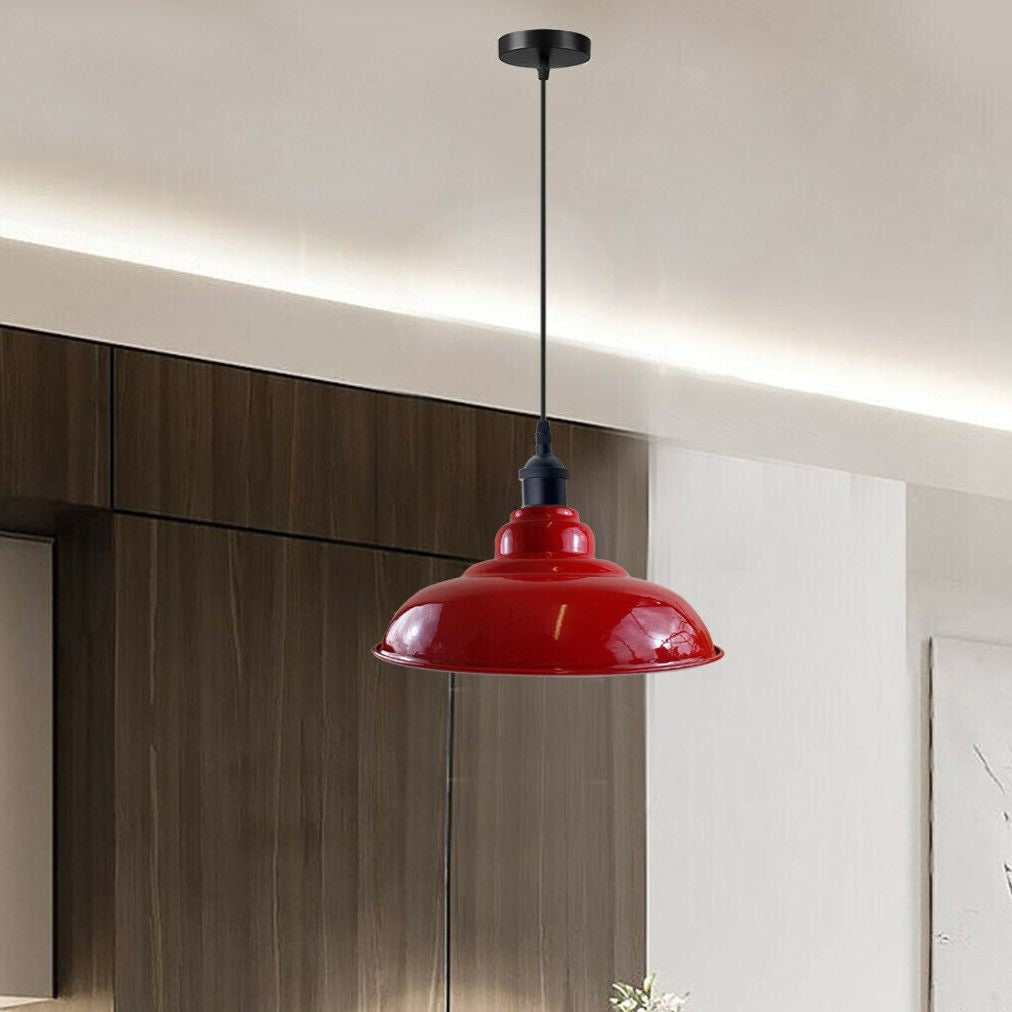 Red ceiling light shade adds vibrancy to kitchen island/bar.