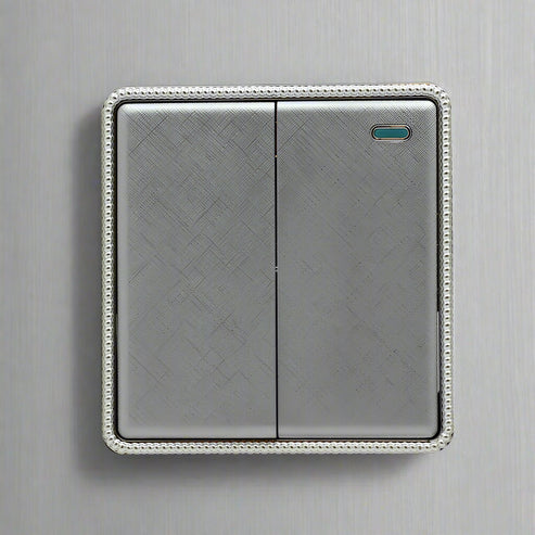 Brushed chrome screwless light switch and socket UK