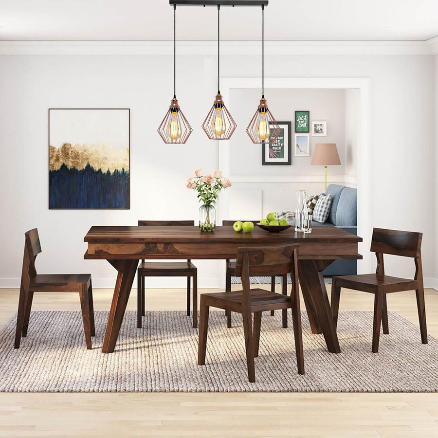 Black metal cage pendant lights in a living room